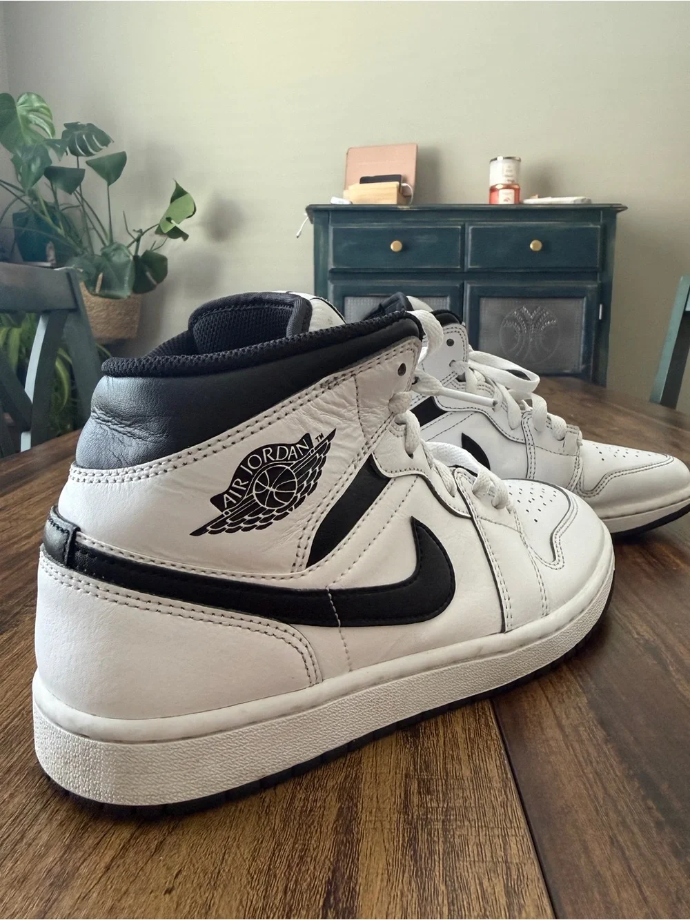 Nike Air Jordan 1 White and Black Mid-Top Sneakers